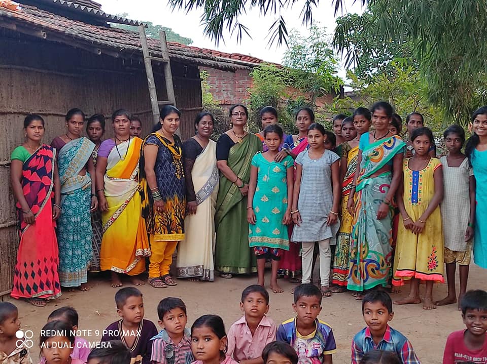 Flood relief distribution with essential supplies being handed to affected families